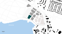 Kartenübersicht mit Wasserfläche links und einem Stadtgebiet rechts, das in verschiedene graue und schwarze Flächen unterteilt ist