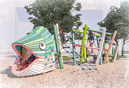 Bunter Spielplatz mit einem großen Fischkopf aus Holz, Klettergerüst mit Seilen und mehreren spielenden Kindern