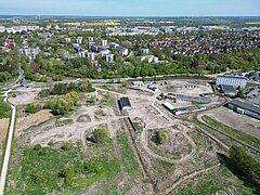 Luftaufnahme des Baulandes mit den angrenzenden Wohngebieten Dierkow und Toitenwinkel und viel Grün